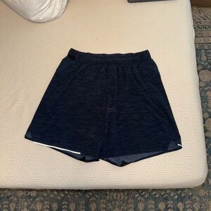 Men's linerless lululemon surge shorts